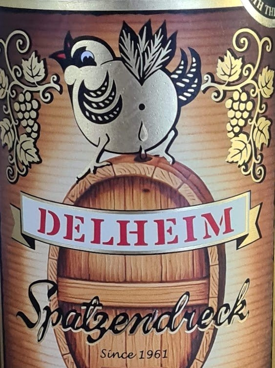 Ikonisches Flaschen-Label vom Dessertwein "Delheim Spatzendreck"